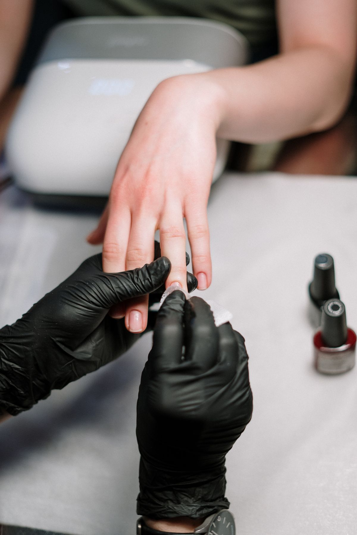 Gel manicure detail work at a nail salon